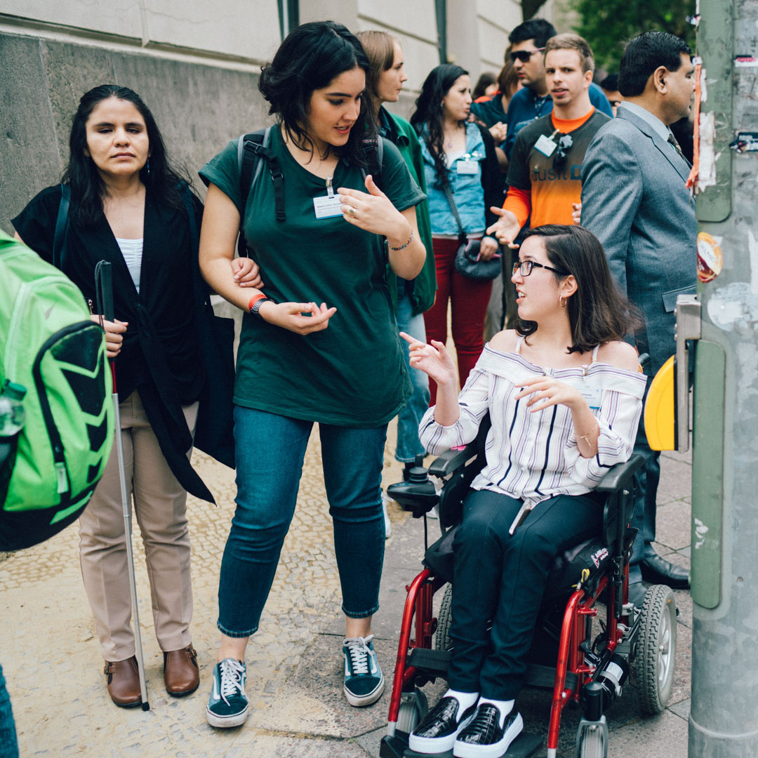students with and without disabilities talking to each other
