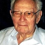 Harry Salinger with glasses and white shirt as an older man