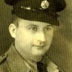 Black and white picture of Ernst Rosenberg. He is wearing a uniform and a matching cap. Black and white picture of Ernst Rosenberg. He is wearing a uniform and a matching cap.