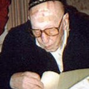 Photograph of Max Kleinmann, looking down, wearing glasses and a kippah. Photograph of Max Kleinmann, looking down, wearing glasses and a kippah.