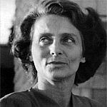 Elly Freund as a young woman with a dress and medium-length hair.