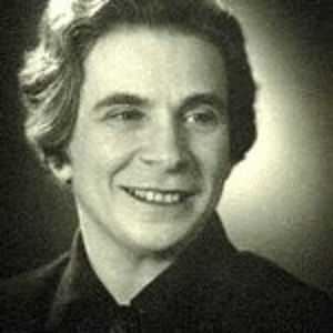 Black and white picture of Hilde Levi, she looks to the right of the camera and smiles. Black and white picture of Hilde Levi, she looks to the right of the camera and smiles.