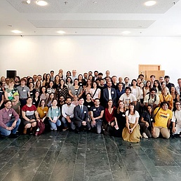 Group photo in a hall.